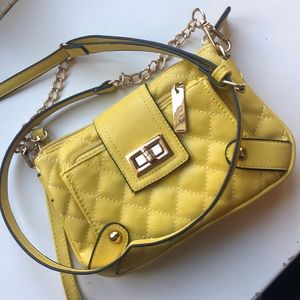 Yellow purse with adjustable strap